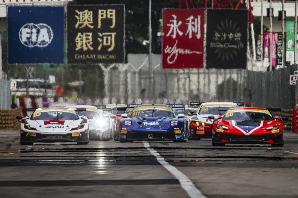 Ferrari and Porsche GT3 cars racing on the streets of Macau