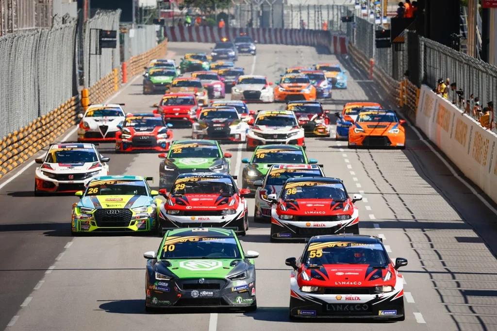 Touring cars racing between the barriers at Macau