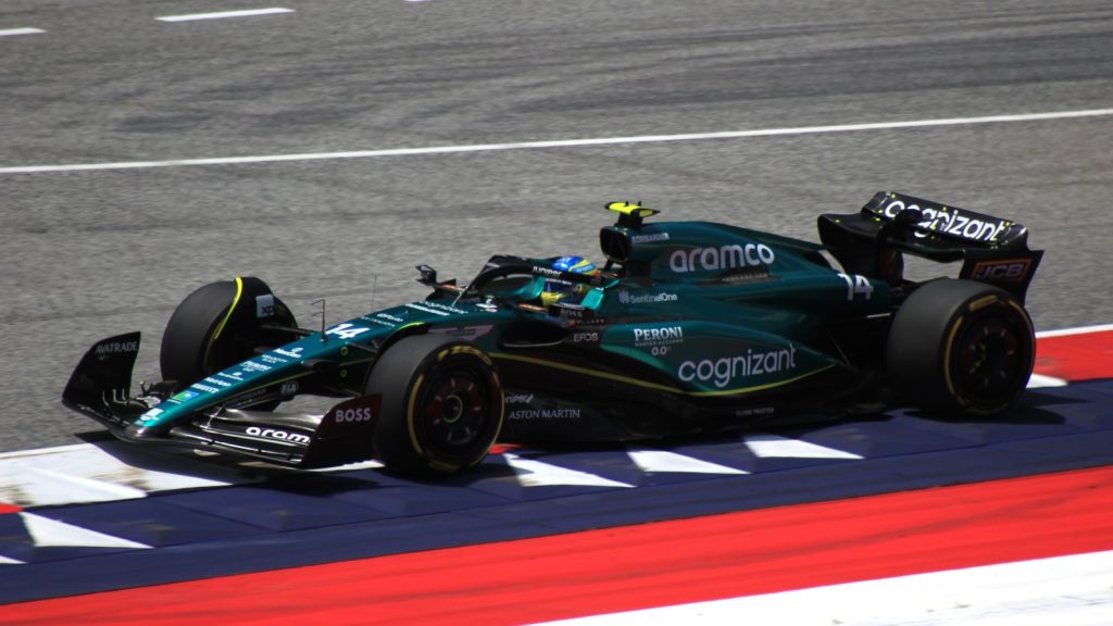 Fernando Alonso driving the Aston Martin AMR23 at the 2023 Austrian Grand Prix.