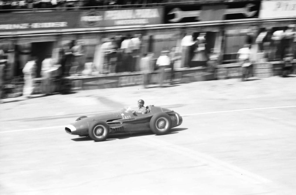 Juan Manuel Fangio leads the 1957 German Grand Prix in a Maserati 250F