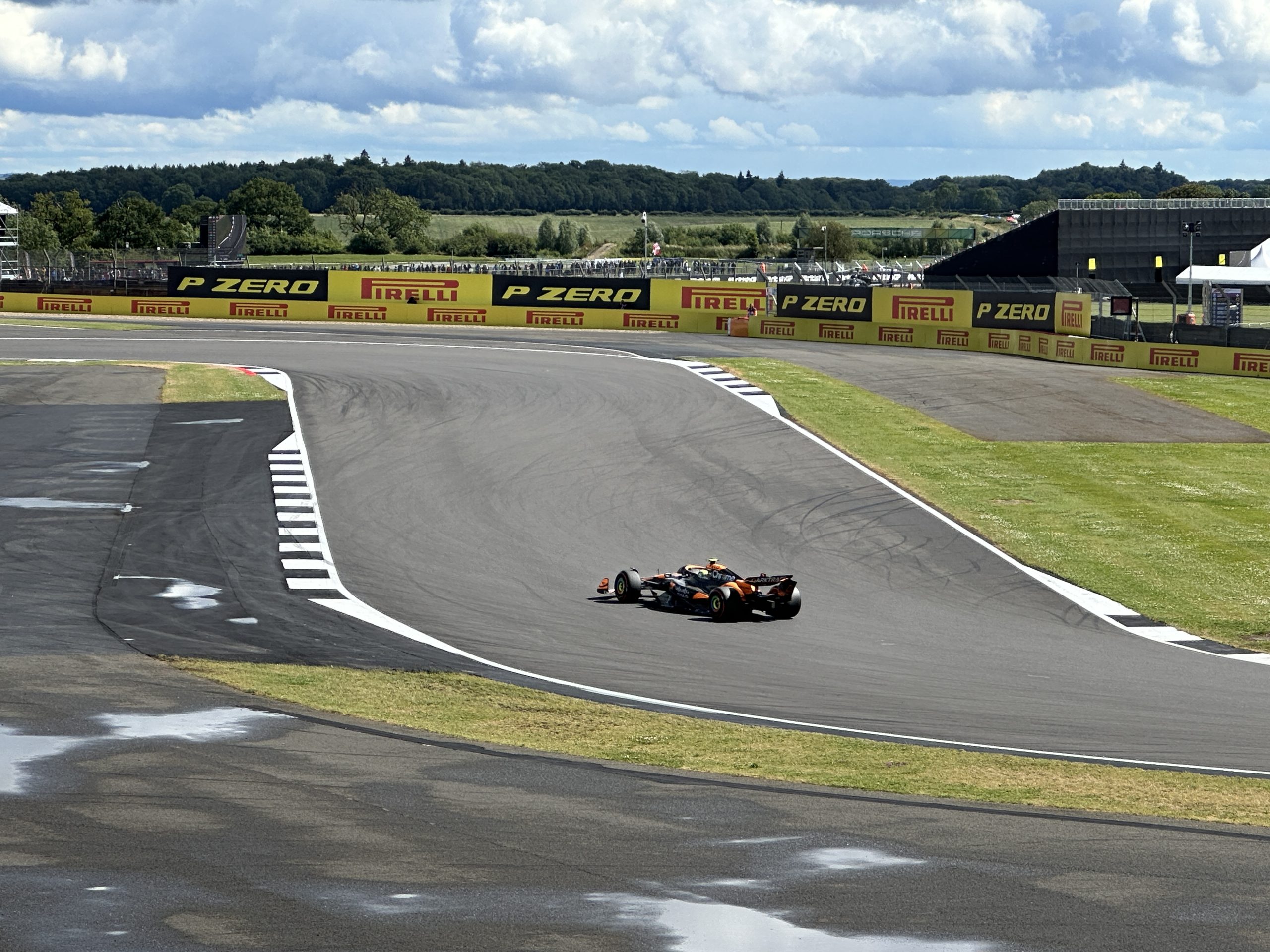 Lando Norris driving his McLaren Formula 1 car through a corner during qualifying at Silverstone.