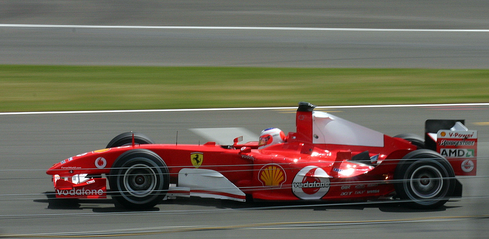Rubens Barrichello drives the Ferrari F2004 at Silverstone during the 2004 British Grand Prix.