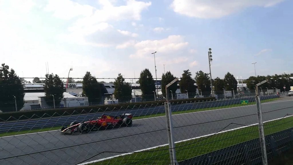 Charles Leclerc driving a Ferrari at Monza.
